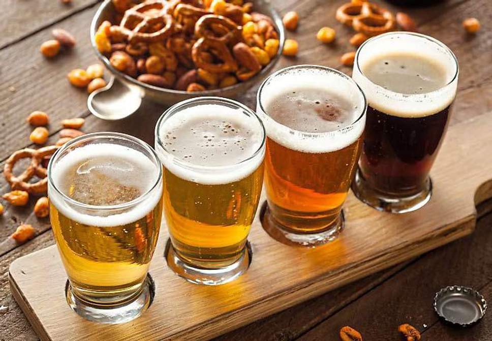 Đau bụng kinh có nên uống bia?